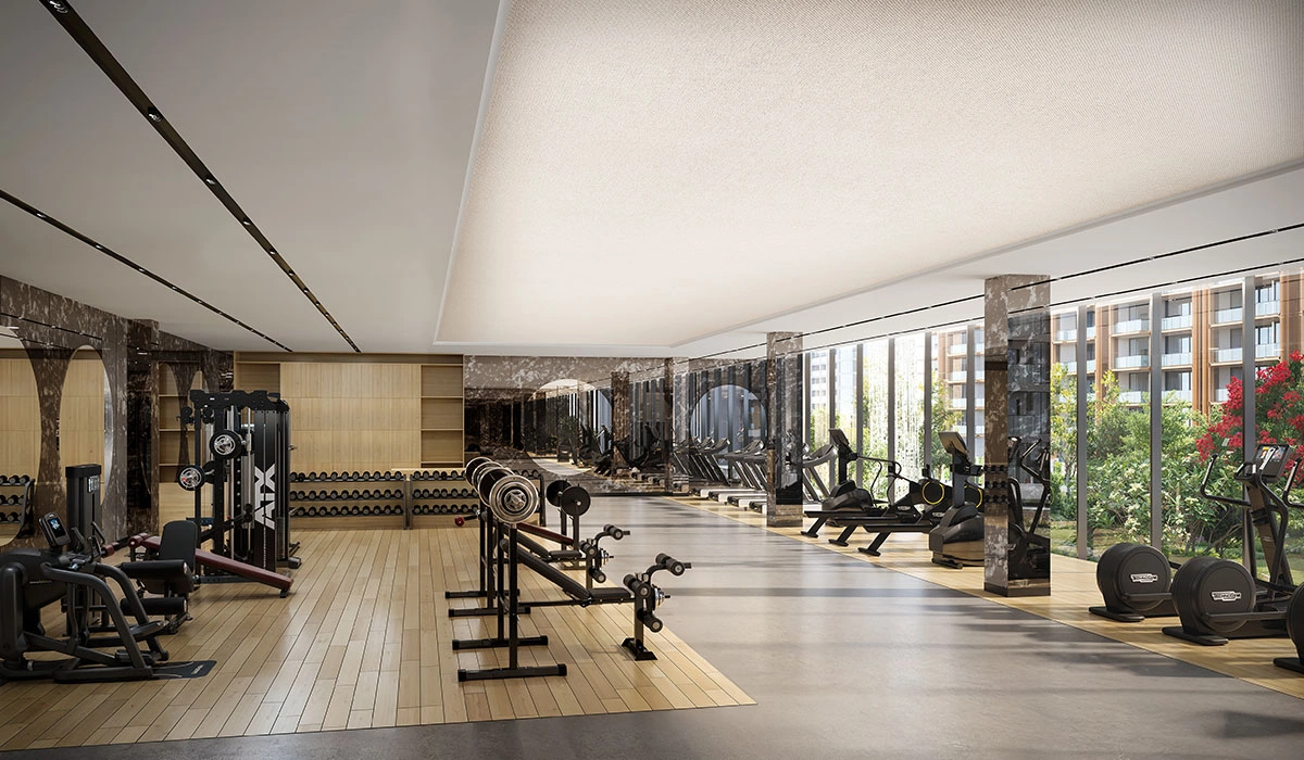 Fully equipped gym with skyline view at The Oryza